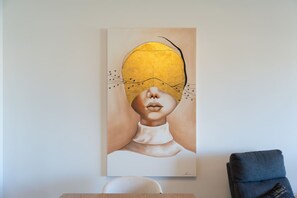 A painting of a person with a yellow head on a wall. - Marina Village Retreat Pool Garage Location (Lagos)