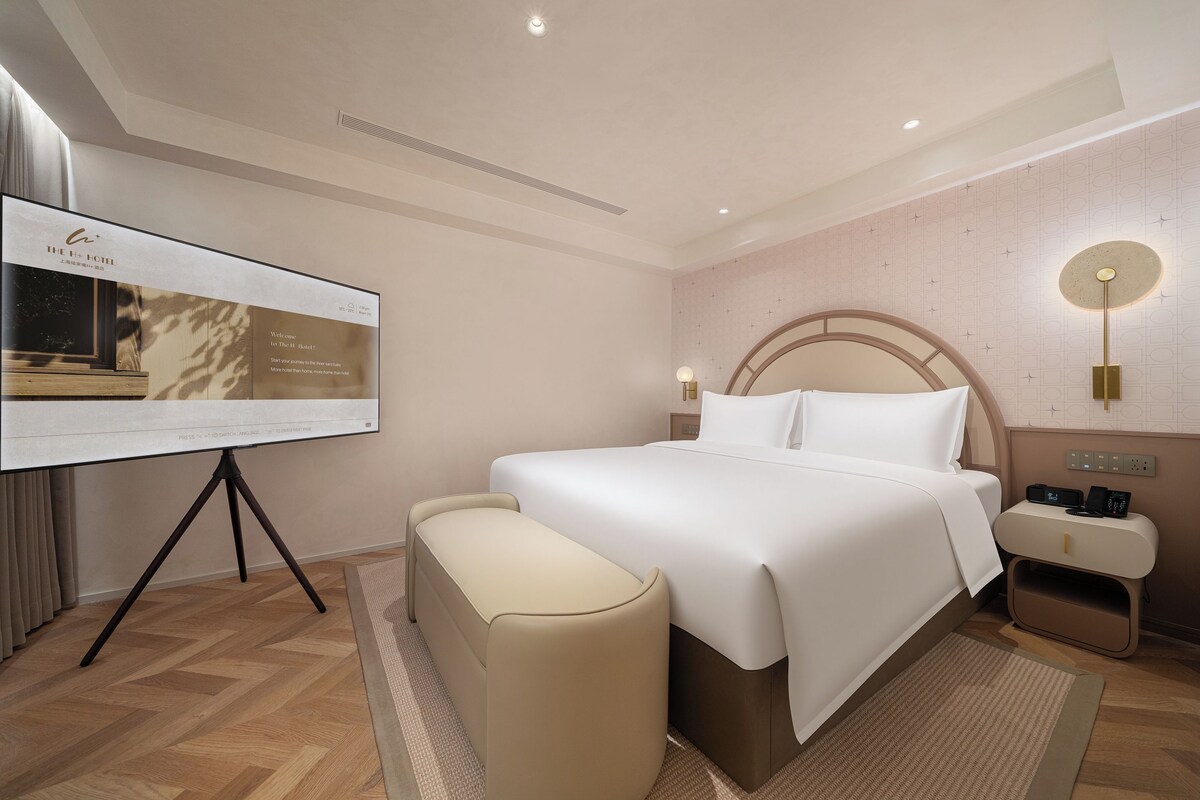 Tabla de planchar con plancha, wifi gratis y ropa de cama 