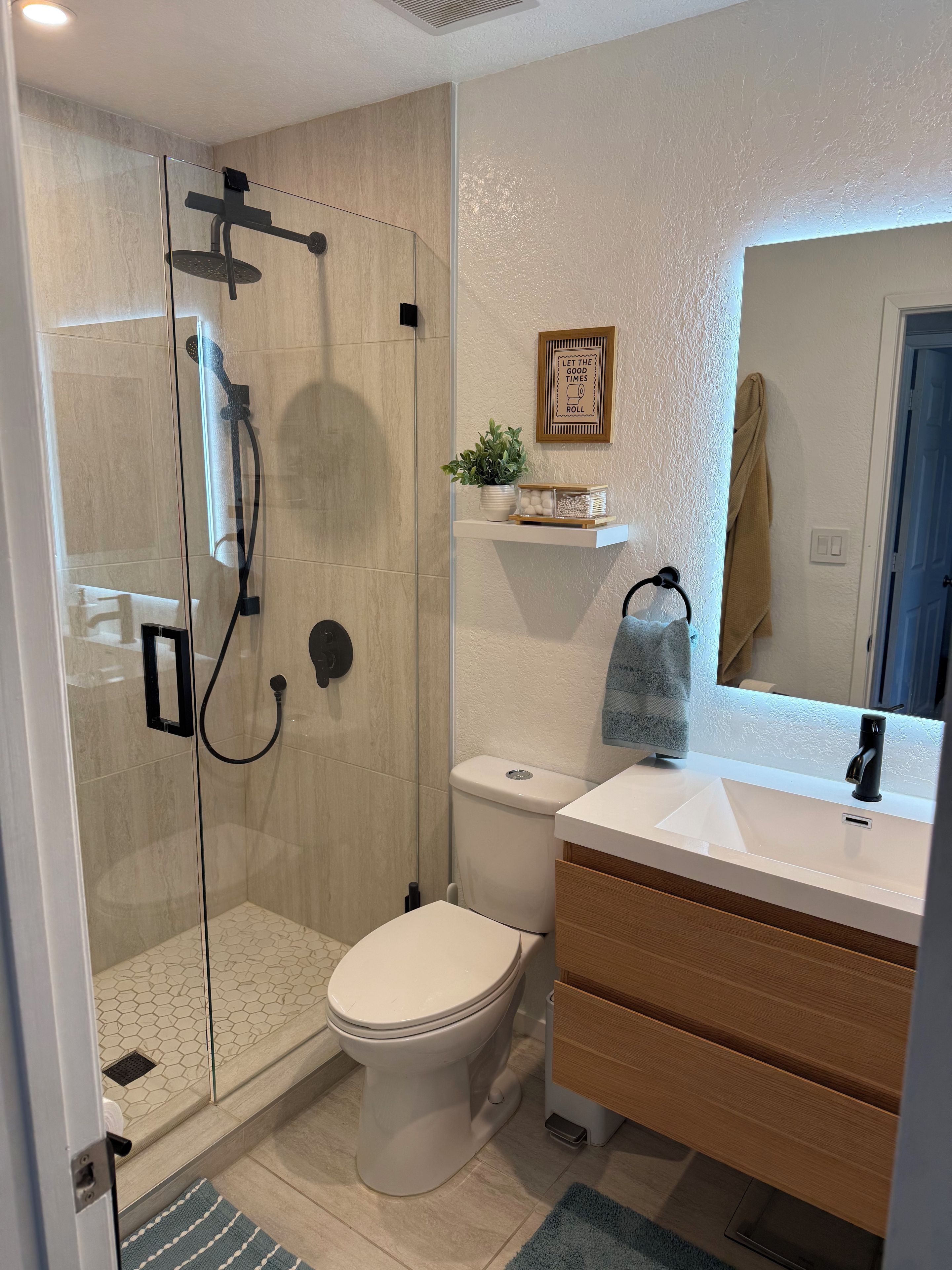 Shower, hair dryer, towels, soap