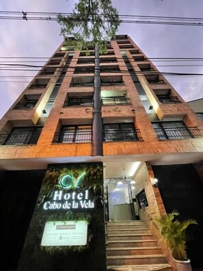 A hotel entrance with a sign for 'Hotel Cabo de la Vela,' featuring a staircase leading up to the entrance. - CV hotel medellin  (Medellin)
