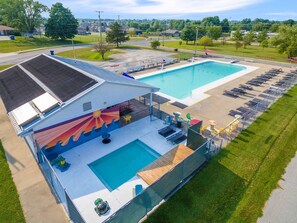 A rooftop pool area with a covered seating area and lounge chairs. - Misty Lane Retreat | Walk to Parks & Disc Golf (Ashland)