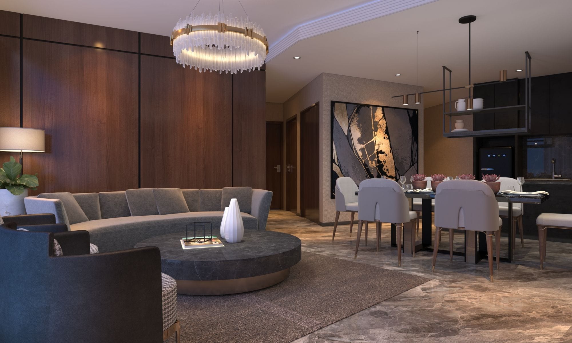 Un salon moderne avec un canapé d’angle, une table basse ronde et un coin repas comprenant une table et des chaises.