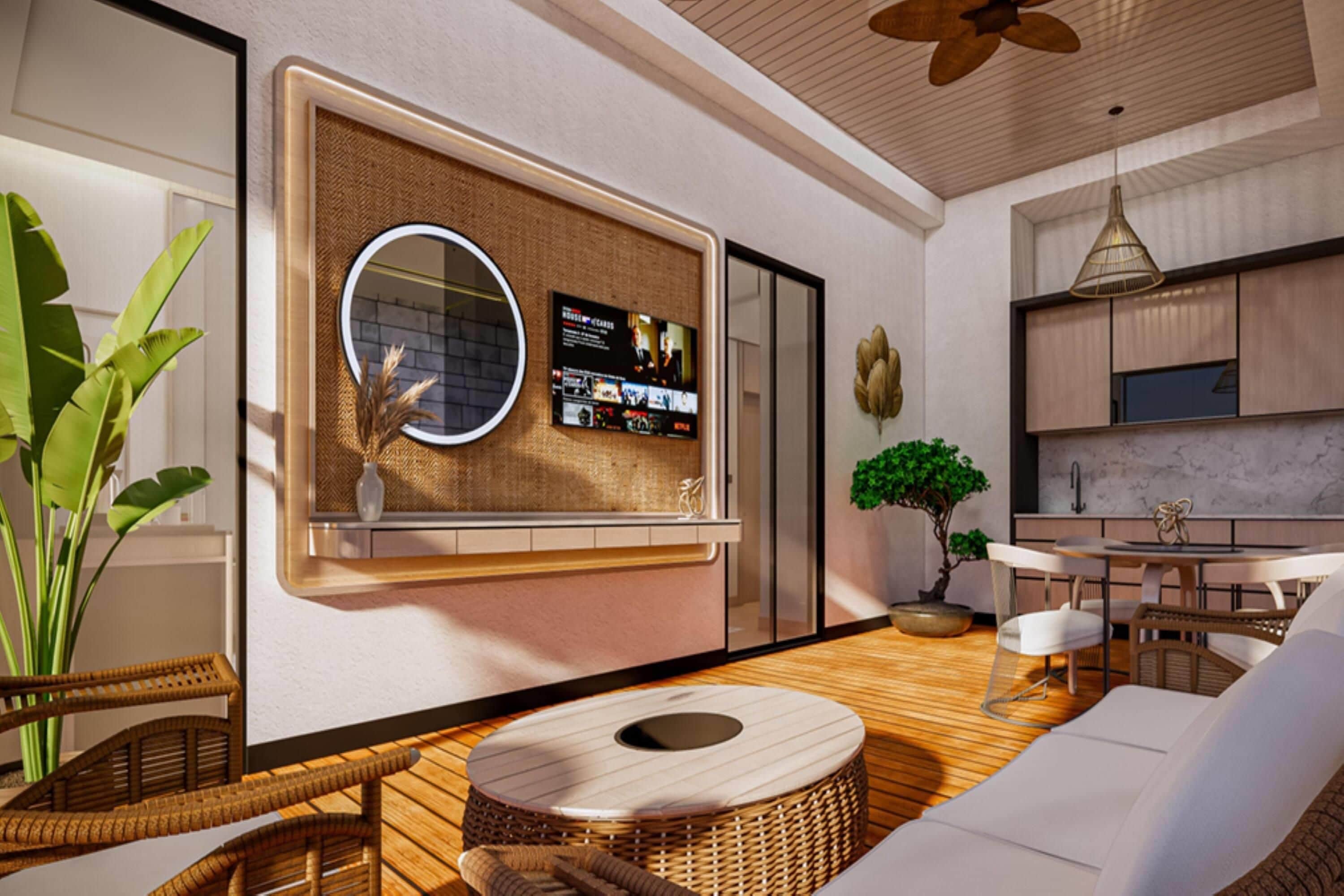 A modern interior with a living area, kitchen, and a wall-mounted entertainment unit.