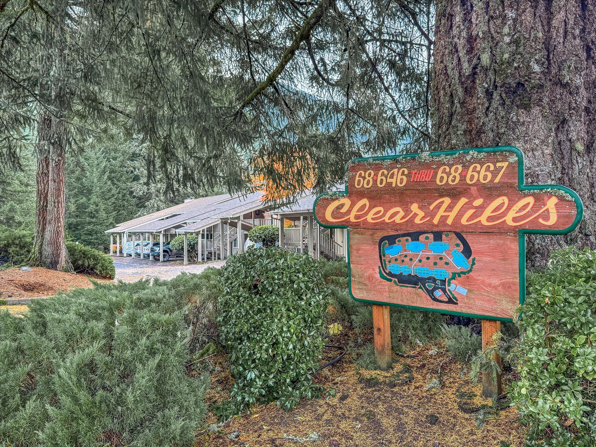 A wooden sign with a map and the name 'ClearHills' indicating a location.