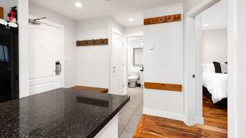 Shower, hair dryer, towels, shampoo