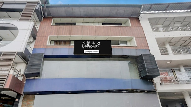 A multi-story building with a sign that reads 'Collection Company-Serviced.' - Collection O Jaigaon Near Bhutan Gate (Alipurduar)