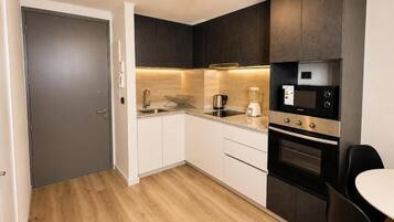 Apartamento Confort, vistas a la ciudad | Cocina privada