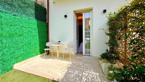 Deluxe Double Room, Garden View | Outdoor dining - A&V Boutique Apartments Angelika (Viareggio)