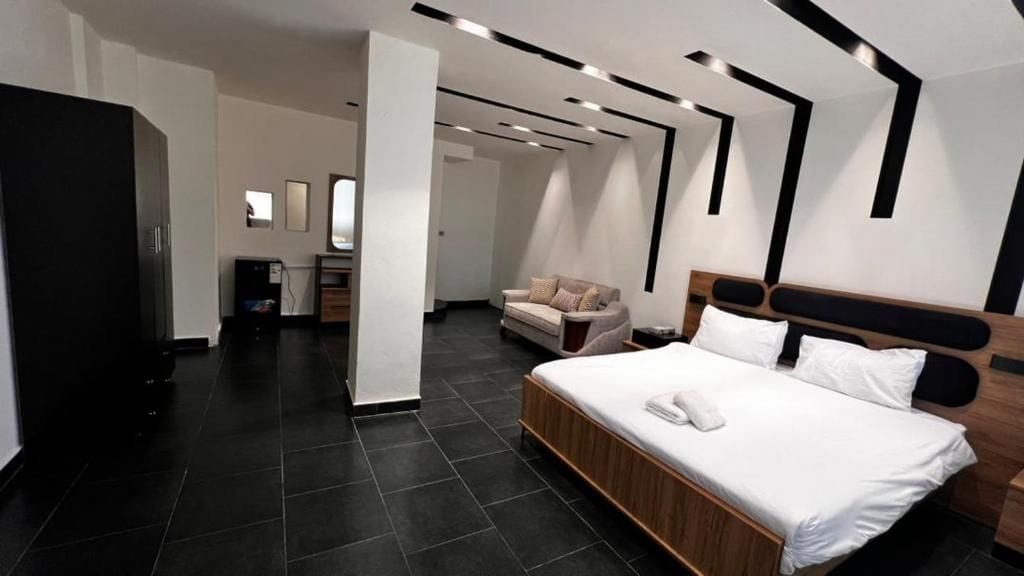 Suite Deluxe, vue sur la ville | Coffre-fort, accès au Wi-Fi (inclus)