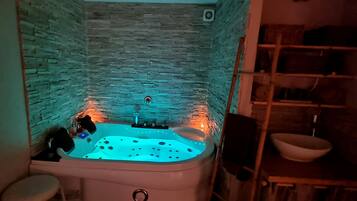 Jetted bath, hair dryer, towels, soap