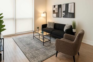 TV, offices - The One: A 1BR Stay That Feels Like Home (Chicago)