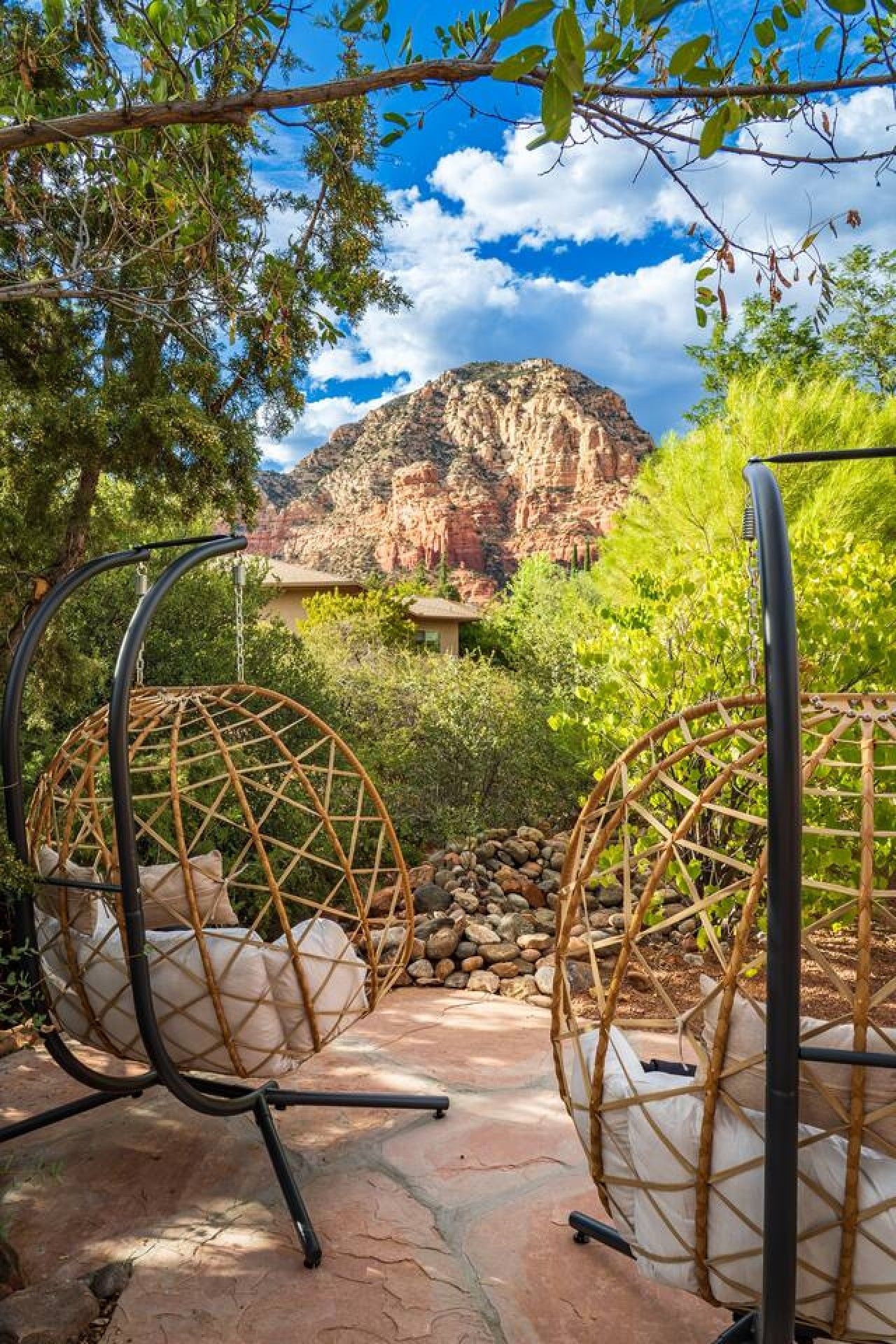 Outdoor seating with a view of a mountain.