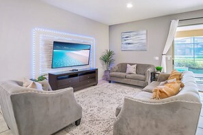 Cozy Lounge With Plush Seating And Large Smart TV - Disney Getaway w Pool, Hot Tub, Theater & Games (Kissimmee)