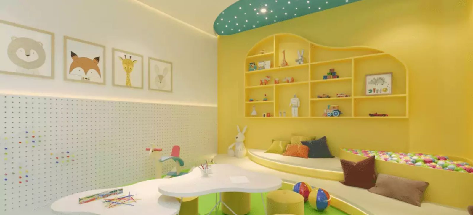 A child-friendly room with a play area, a white wall with dot patterns, and a yellow shelving unit with toys.
