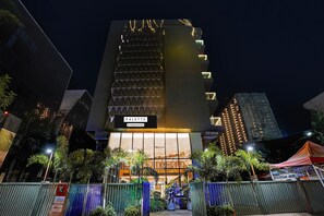 A modern building with a sign reading "PALETTE & Company Services" at the entrance. - Palette City Formerly Emerald Guestimony (Pune)