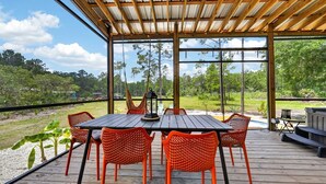 Outdoor dining - Tiny Home Village: 4 Units, 4 Spas, Plunge Pool, Sleeps 15 (St. Augustine)