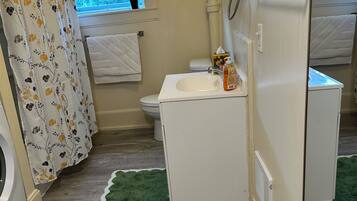Hair dryer, towels, soap, toilet paper
