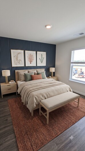 A bedroom with a bed, bedside tables, a bench, a window, and wall-mounted artwork. - Saltmeadow Bethany Beach (Millville)