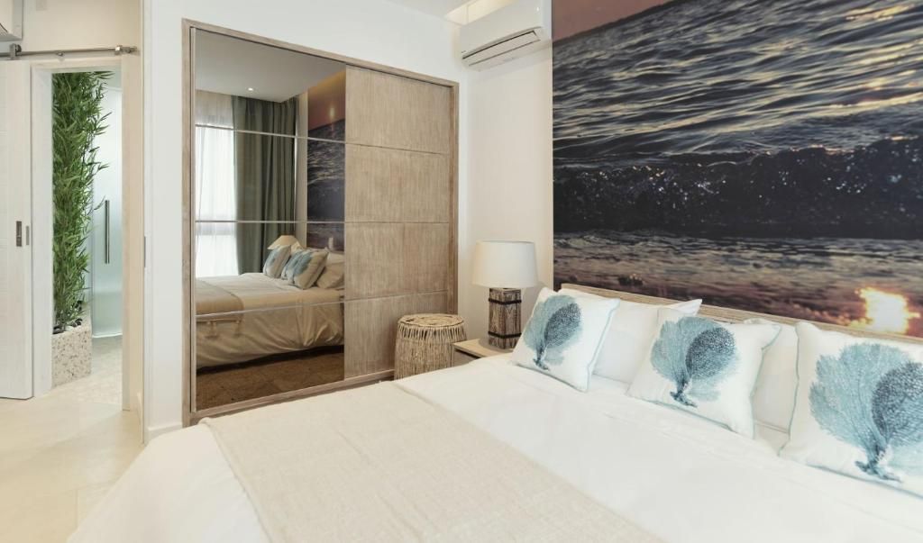 Suite Deluxe, vista al océano | Caja de seguridad en la habitación y insonorización 