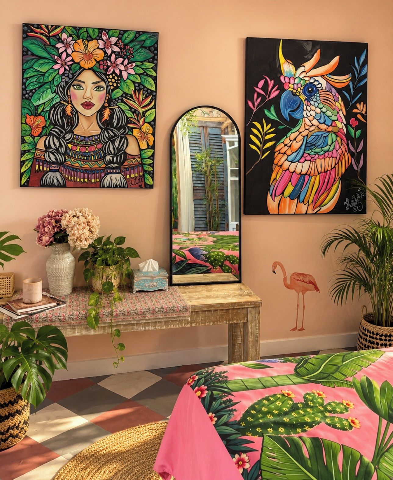 A room with a bed, a mirror, and two vibrant paintings on the wall.
