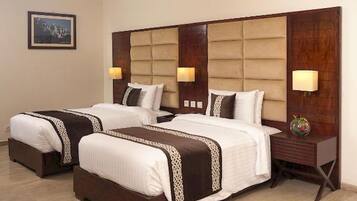 Deluxe Twin Room | Minibar, in-room safe, desk, laptop workspace