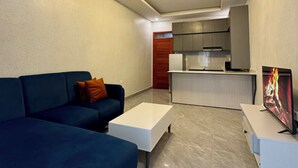 Departamento, 2 habitaciones, balcón, vista a la ciudad | Área de sala de estar