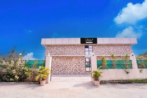 A building with a sign that reads 'Collection' and 'Company Serviced.' - Collection O Khoni Taloja Bypass (Kalyan)