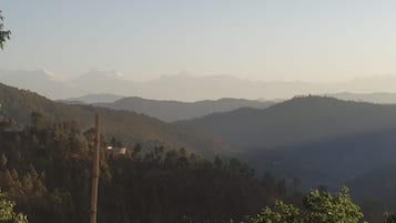 A mountainous landscape with a clear sky.