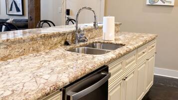 Well-appointed kitchen with granite counters
