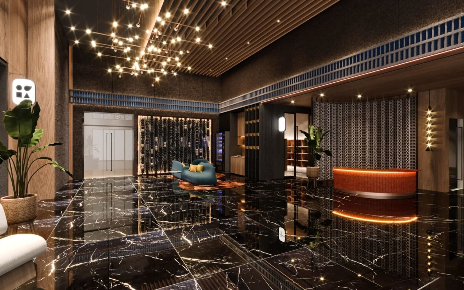 A modern lobby with a marble floor, a reception desk, and a seating area with a blue sofa.