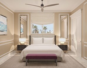 A hotel bedroom with a large bed, bedside lamps, a ceiling fan, and a view of palm trees. - The Grand Resort Rarotonga - Adults Only (Rarotonga)