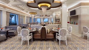 A luxurious hotel lobby with a central seating area, elegant chandeliers, and a patterned floor. - Fortune Select Forest Hill Kasauli (Solan)