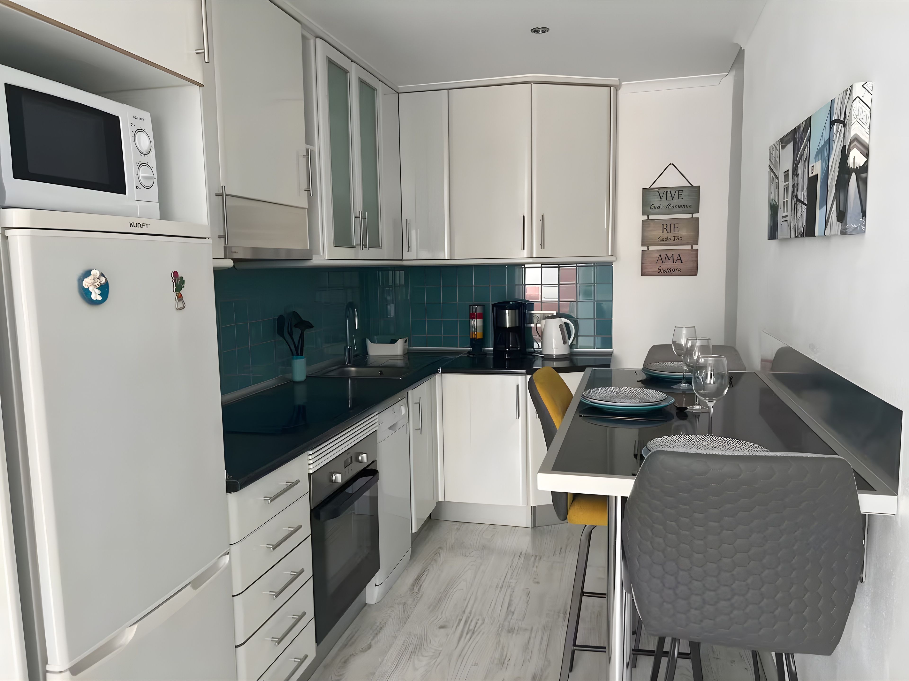 Coffee/tea maker, fridge, microwave, oven