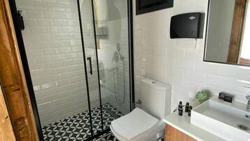Superior Bungalow, Patio, Pool View | Bathroom | Free toiletries, hair dryer, slippers, towels
