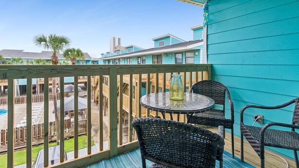 Outdoor dining - Lani Kai #203 | Pool Views & Private Balcony (Gulf Shores)
