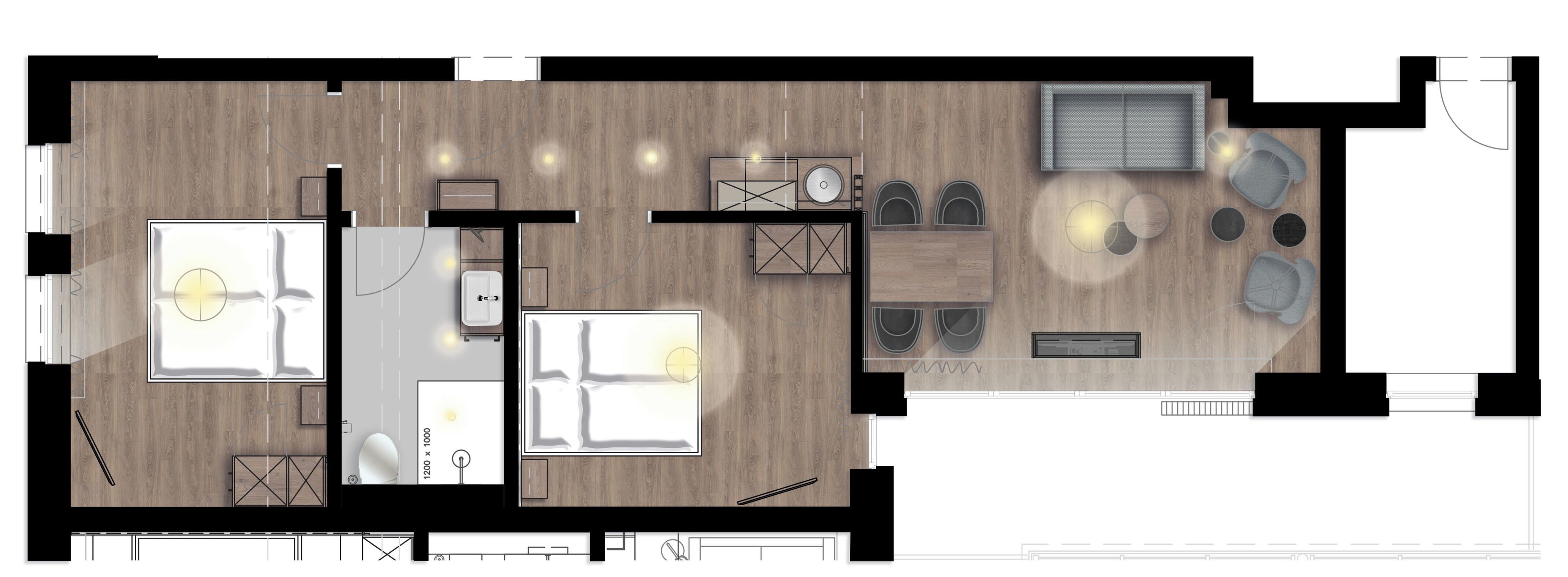 A hotel room layout with a bed, bedside table, and a small seating area.