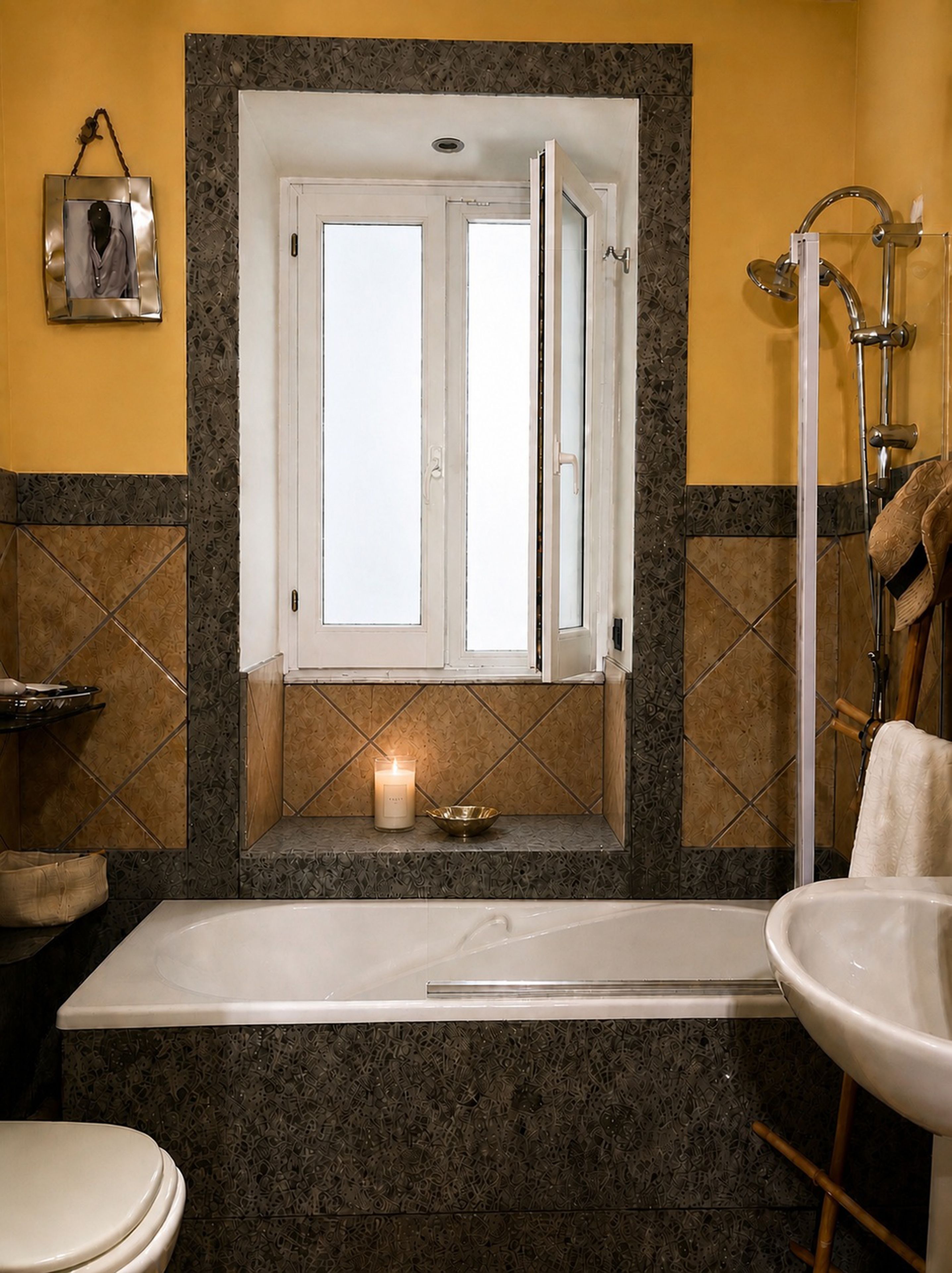 A bathroom with a bathtub, a shower, a toilet, and a sink.