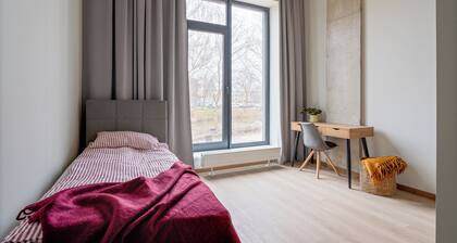 Uniflow Apartments by Rixwell