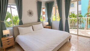 Room - Playa Turquesa C-202, cozy 3-bedroom apartment, AC and WiFi, free beach chairs (Bavaro)