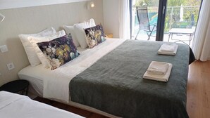 Deluxe Triple Room, Balcony, Courtyard View | Soundproofing, iron/ironing board, free WiFi - Relax & Travel (Almada)