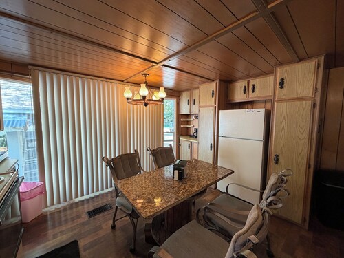 Rustic 3-bedroom mobile home with game room on large lot in Maybell,