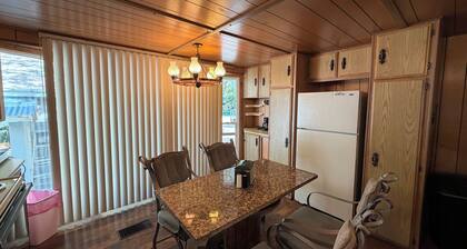 Rustic 3-bedroom mobile home with game room on large lot in Maybell,