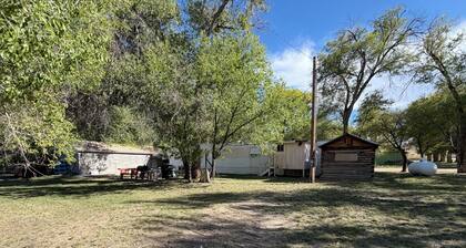 Rustic 3-bedroom mobile home with game room on large lot in Maybell,