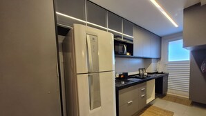 Superior Apartment, City View | Private kitchen - PP - Neo Petrópolis - Apto NP148 (Presidente Prudente)