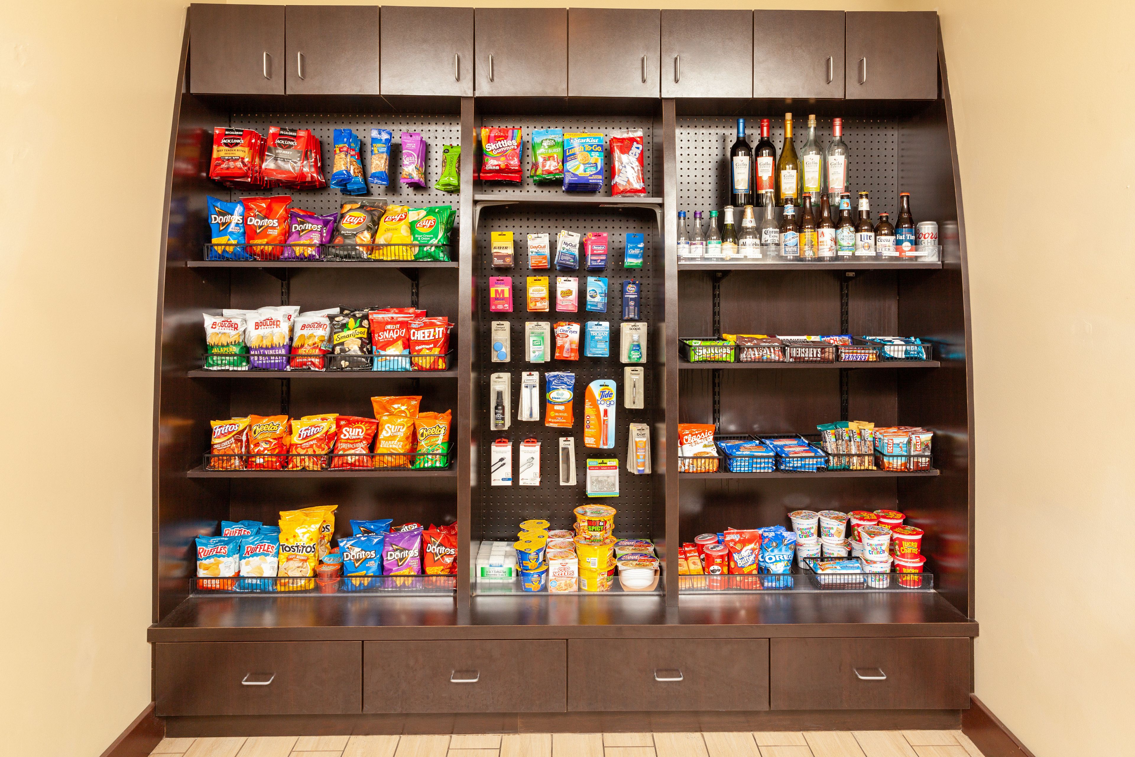 A snack and beverage display with various brands and products.