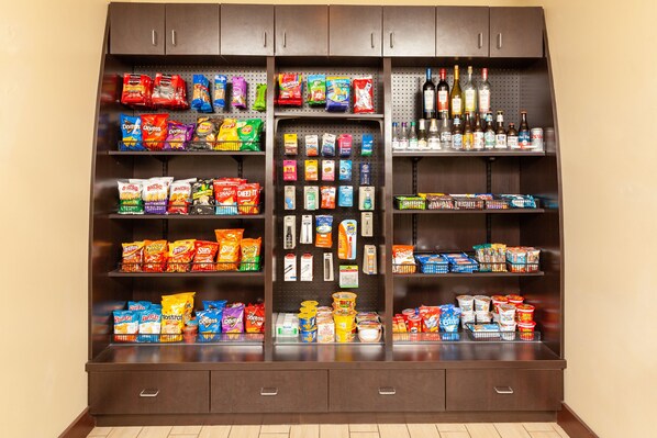 A snack and beverage display with various brands and products.