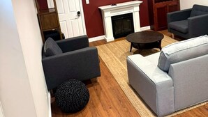 Living area - Stylish Basement-Level Apartment (Quincy)