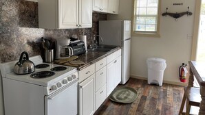 Deluxe Cabin, Pets allowed | Private kitchen - Rockport RV Resort (Rockport)