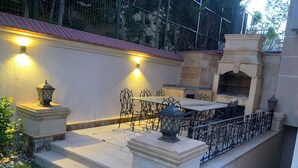 Outdoor dining - Gorgeous 5-bedroom home with pool and garden in 6th of October, Giza district. (Giza Governorate)