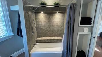 Hair dryer, towels, shampoo, toilet paper